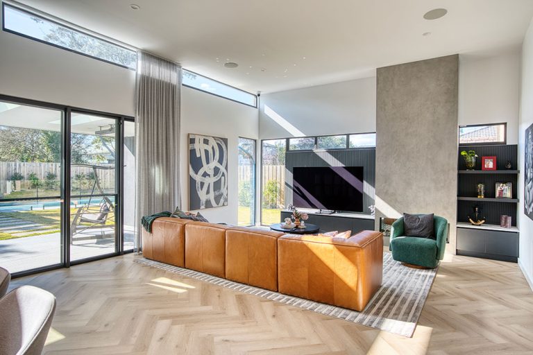 a living room with a couch and a television