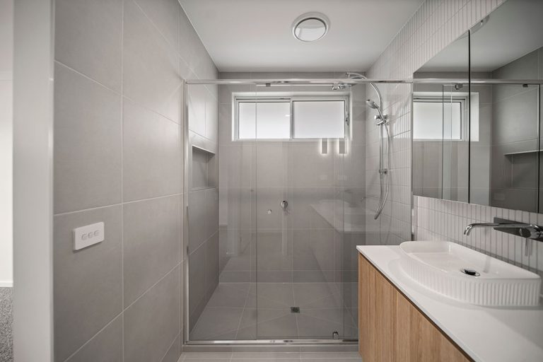 Seaford Road, Seaford: a bathroom with a glass shower and sink